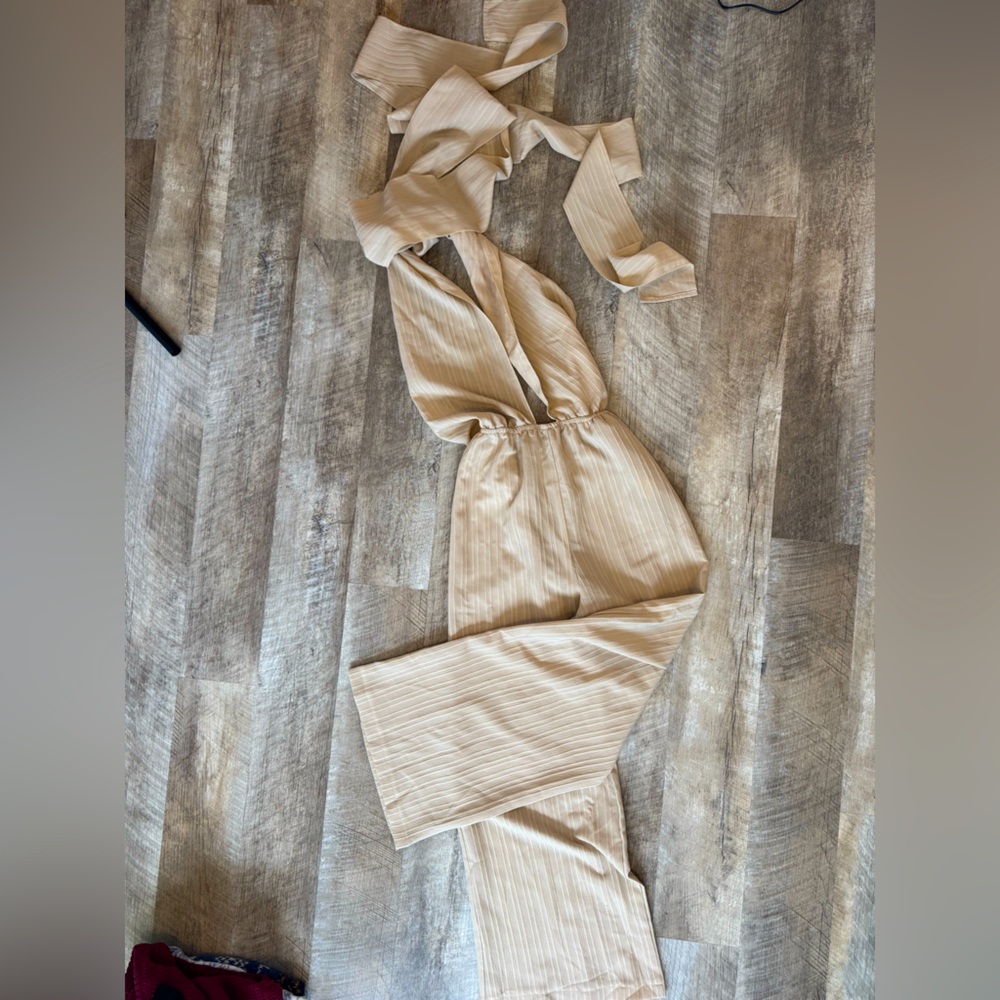 Halter style cream jumpsuit, open back and scarf piece tie for around neck